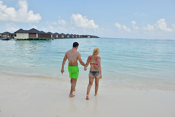 Image showing happy young  couple at summer vacation have fun and relax