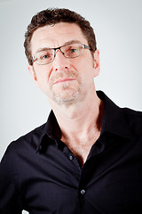 Image showing attractive adult man with glasses and black shirt