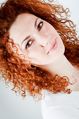 Image showing attractive young redhead woman smiling portrait