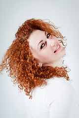 Image showing attractive young redhead woman smiling portrait