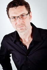 Image showing attractive adult man with glasses and black shirt