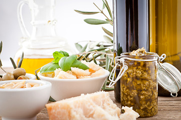 Image showing tatsty geen olives parmesan and olive oil 