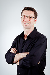 Image showing attractive adult man with glasses and black shirt