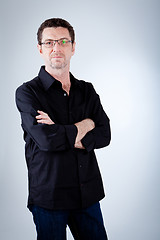 Image showing attractive adult man with glasses and black shirt