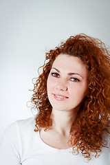 Image showing attractive young redhead woman smiling portrait