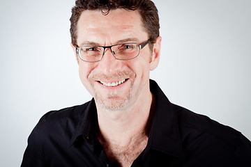 Image showing attractive adult man with glasses and black shirt