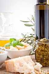 Image showing tatsty geen olives parmesan and olive oil 