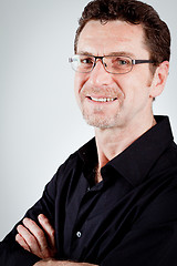 Image showing attractive adult man with glasses and black shirt