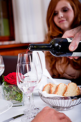 Image showing couple drinking red wine in restaurant