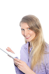 Image showing Blonde attractive woman holding a tablet