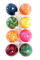 Image showing Colourful marbled Easter Eggs in a box