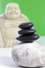 Image showing Three black stones stacked on top of each other