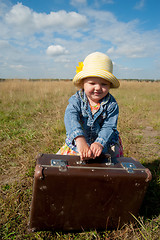 Image showing lonely girl with suitcase