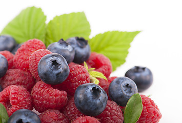 Image showing Many blueberries & raspberries.