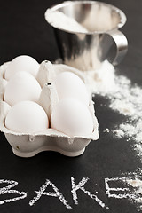 Image showing Carton of eggs and flour