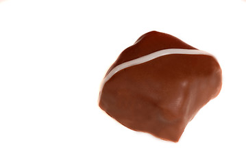 Image showing A piece of semi-sweet chocolate isolated on white