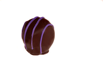 Image showing A piece of dark chocolate isolated on white