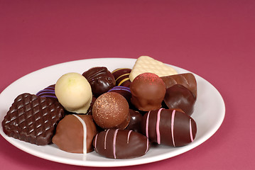 Image showing Plate of delicious dark and semi-sweet chocolates