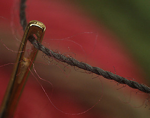 Image showing needle head and thread