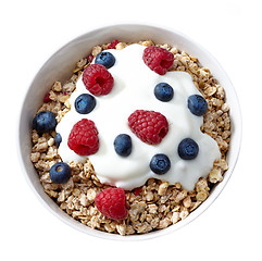 Image showing bowl of muesli and yogurt with fresh berries
