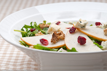 Image showing Fresh pears arugula gorgonzola cheese salad