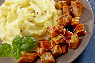 Image showing mashed potatoes and meat stew