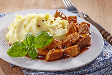 Image showing mashed potatoes and meat stew