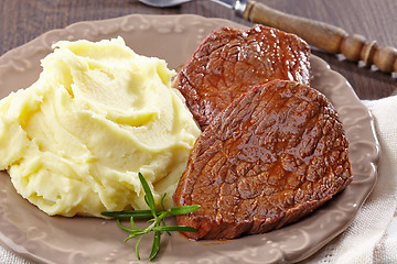 Image showing Mashed potatoes and beef steak