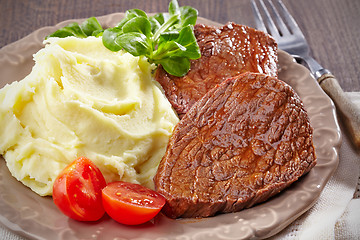 Image showing Mashed potatoes and beef steak