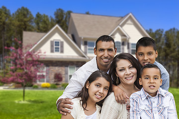 Image showing Hispanic Family in Front of Beautiful House