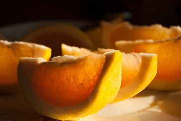 Image showing Freshly harvested grapefruit on plate