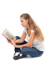 Image showing Girl in the lotus position to read the Book