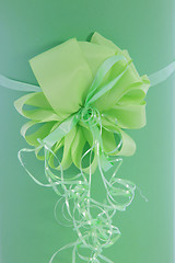 Image showing Beautiful ornamental green bow