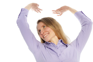 Image showing Smiling woman stretching