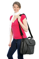 Image showing Young attractive woman carrying a shoulder bag