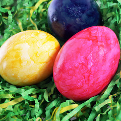 Image showing Easter painted eggs in artificial grass