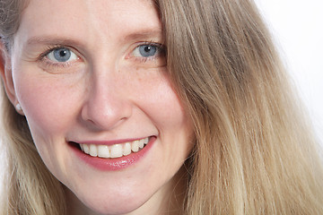 Image showing Close up of an attractive woman with blue eyes