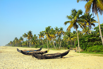 Image showing old fishing boats on beach in india