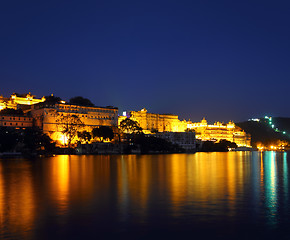 Image showing palace on lake in Udaipur India at night