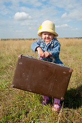 Image showing lonely girl with suitcase