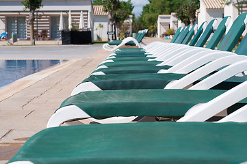 Image showing Pool and  chaise longues