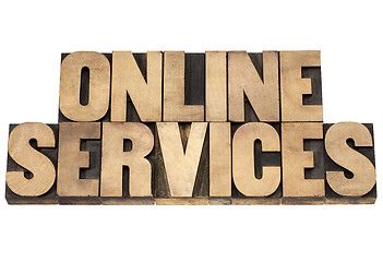 Image showing online services in wood type