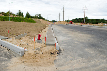 Image showing road construction car roundabout electricity wire 