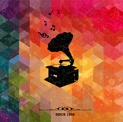 Image showing Retro turntable on colorful geometric background