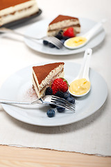 Image showing tiramisu dessert with berries and cream