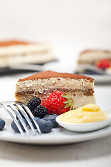 Image showing tiramisu dessert with berries and cream