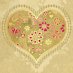 Image showing Old grunge paper with gold heart