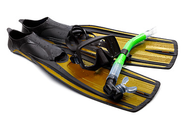 Image showing Mask, snorkel and flippers with water drops. Diving gear on whit