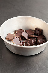 Image showing Bowl of chocolate pieces