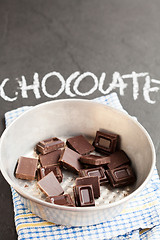 Image showing Bowl of chocolate pieces